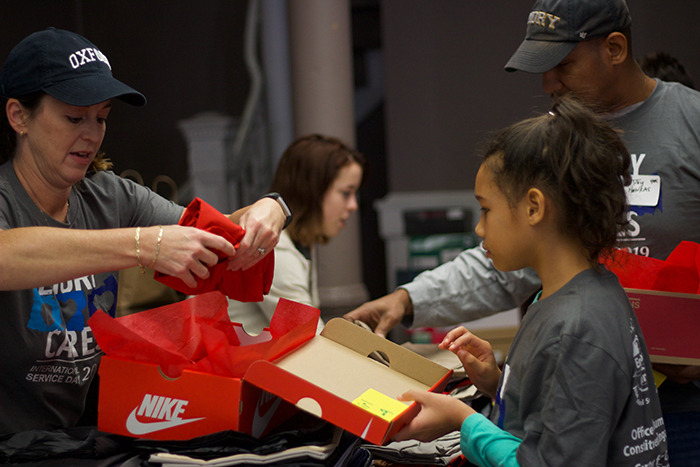 Packing gift boxes for children in the Newton County foster care program